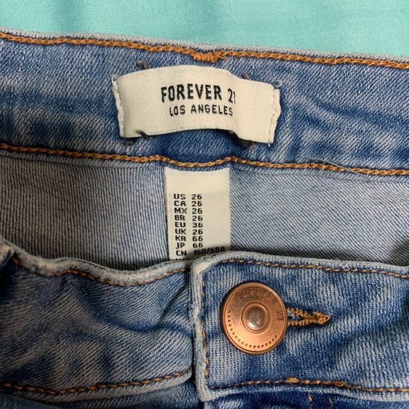 Ripped Skinny Jeans - Picture 2 of 5